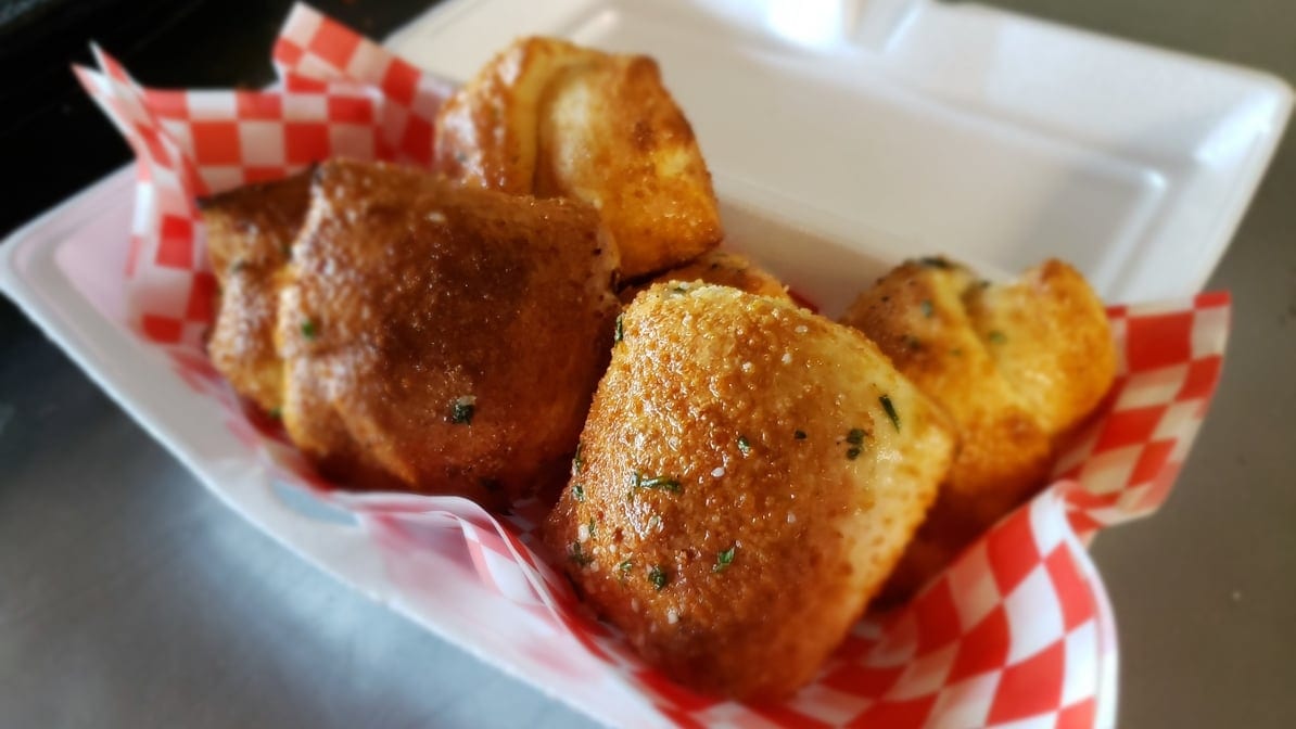 Pepperoni, Jalapeños & Mozzarella Cheese Roll.