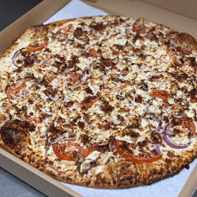Chicken Deluxe Pizza.